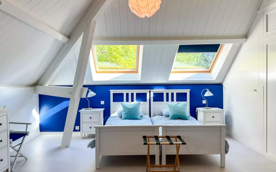 Chambre bleue de la villa à Saint-sur-Semouse - Arrière-Cour immobilier