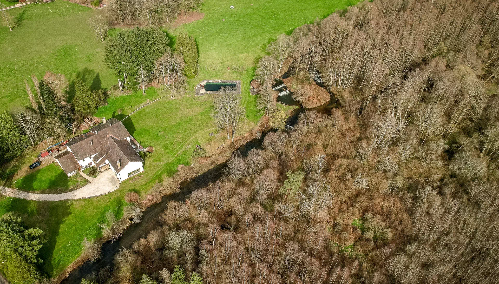 Vue drone de la forêt privée de l'Ancien moulin proche de Luxeuil - Arrière-Cour, agence immobilière spécialisée en Haute-Saône