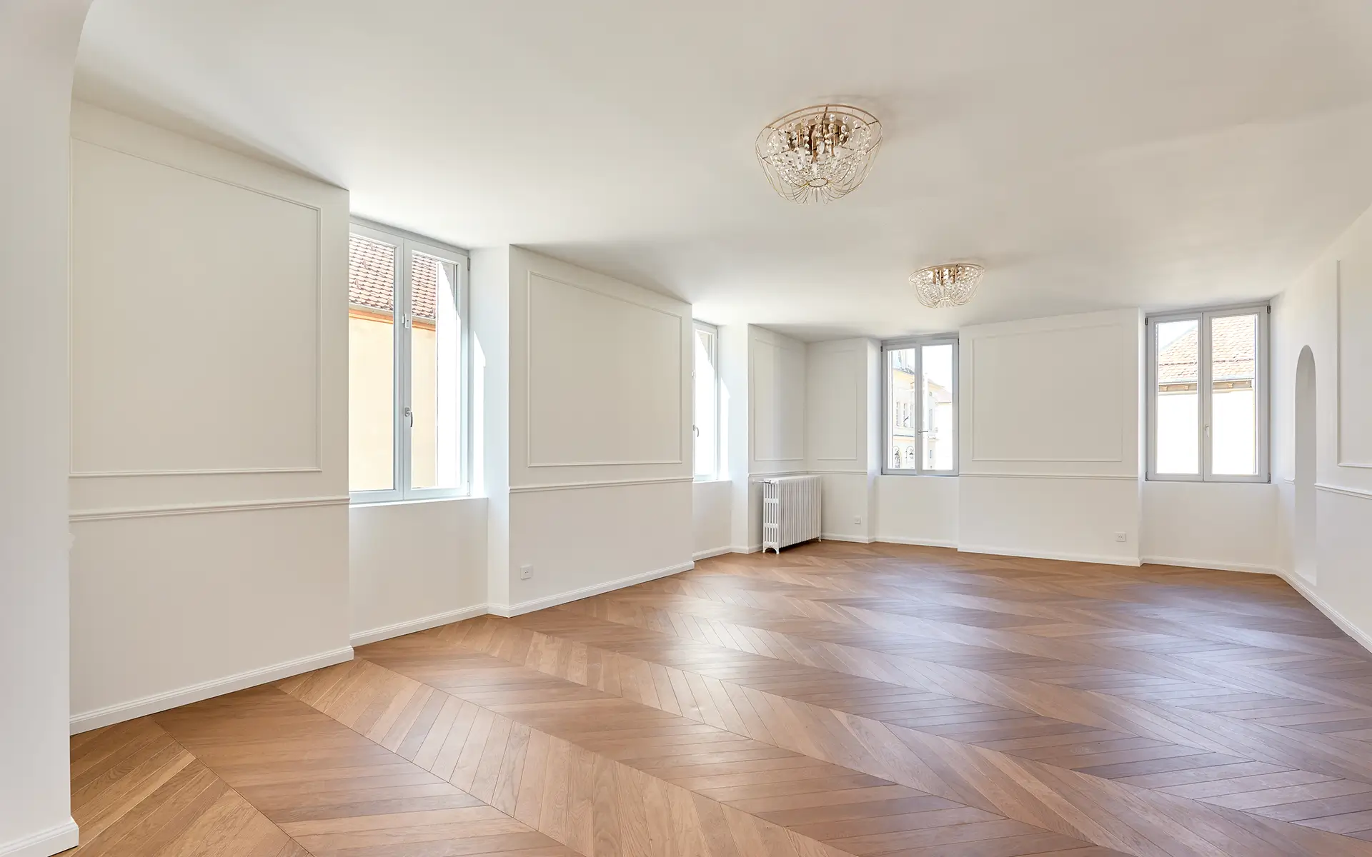 Séjour de l'appartement de caractère rénové à Pontarlier à vendre - Arrière-Cour, agence immobilière spécialisée dans le Doubs